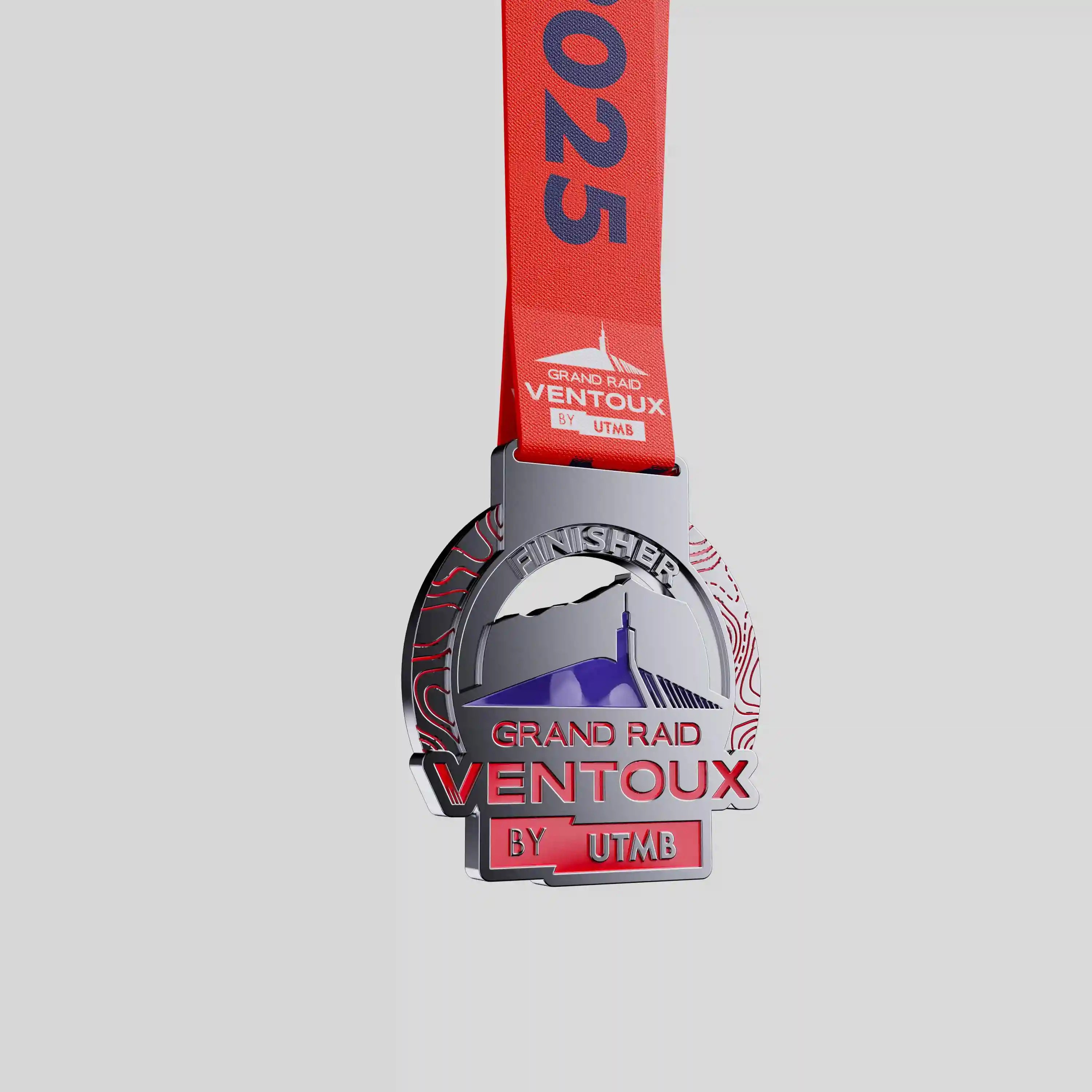 Grand Raid Ventoux metal medal with mountain silhouette and red ribbon