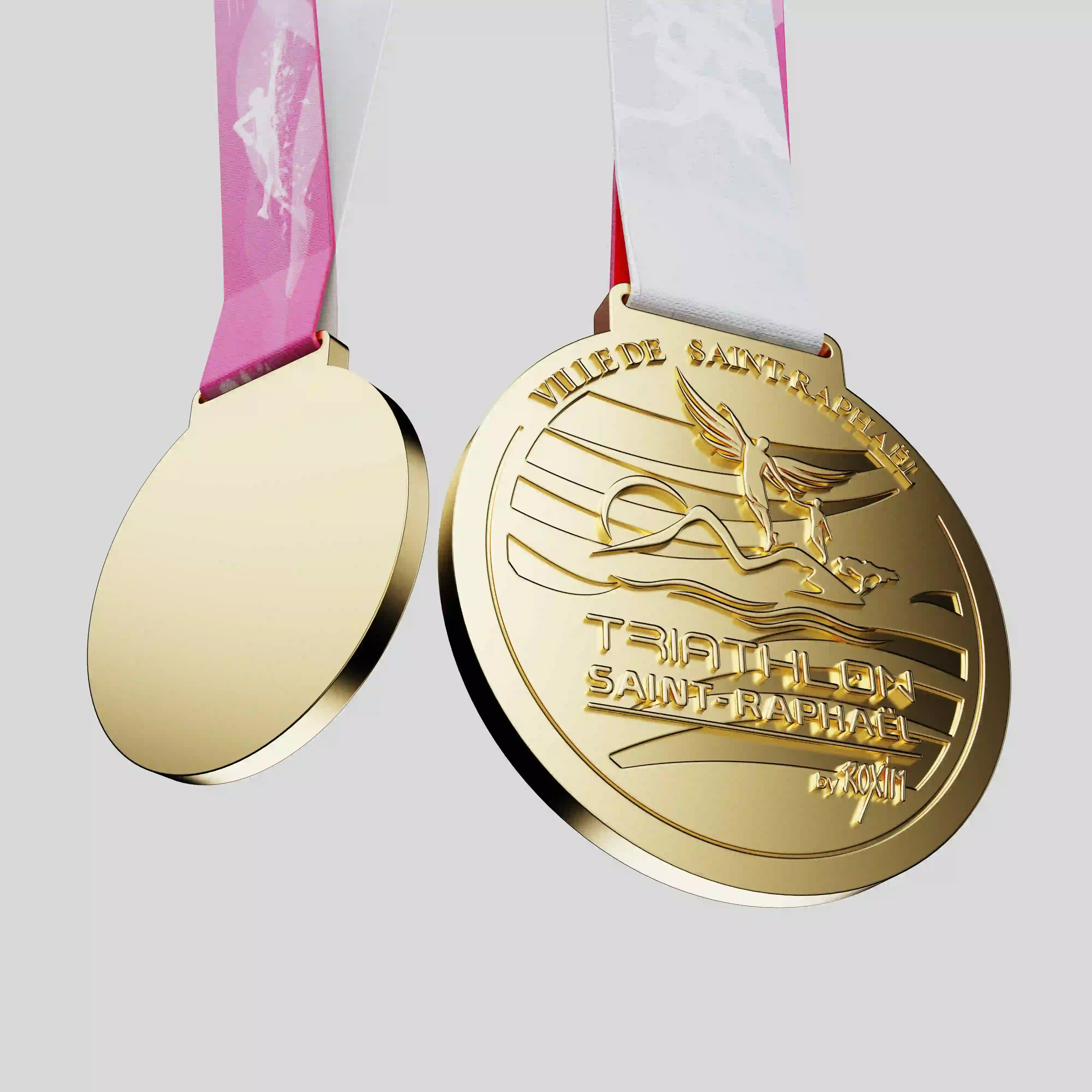 Official Saint-Raphael Triathlon finisher metal medal with white and pink ribbon