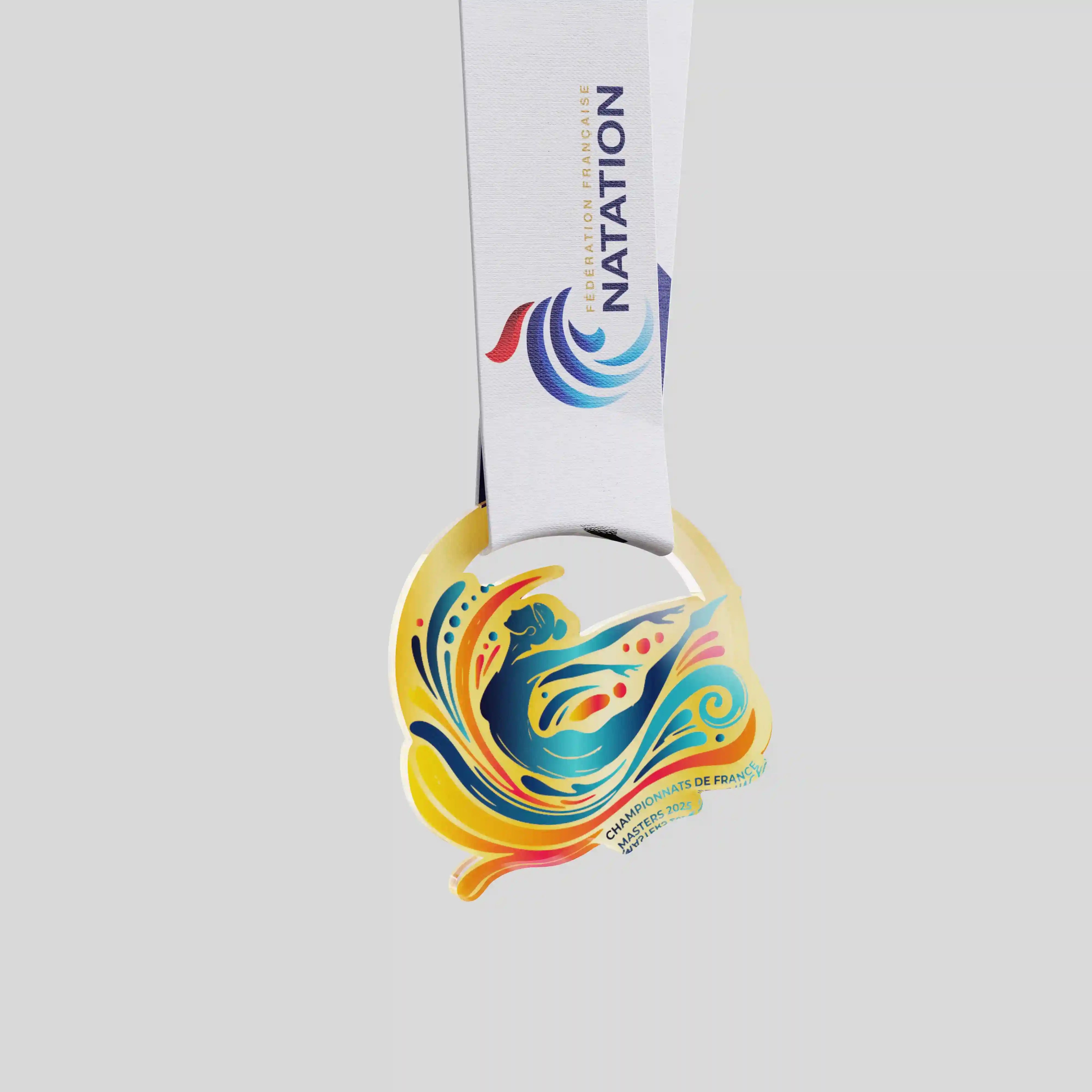 Acrylic medal for the French Swimming Federation Masters Championships with colourful swimmer design and white ribbon.