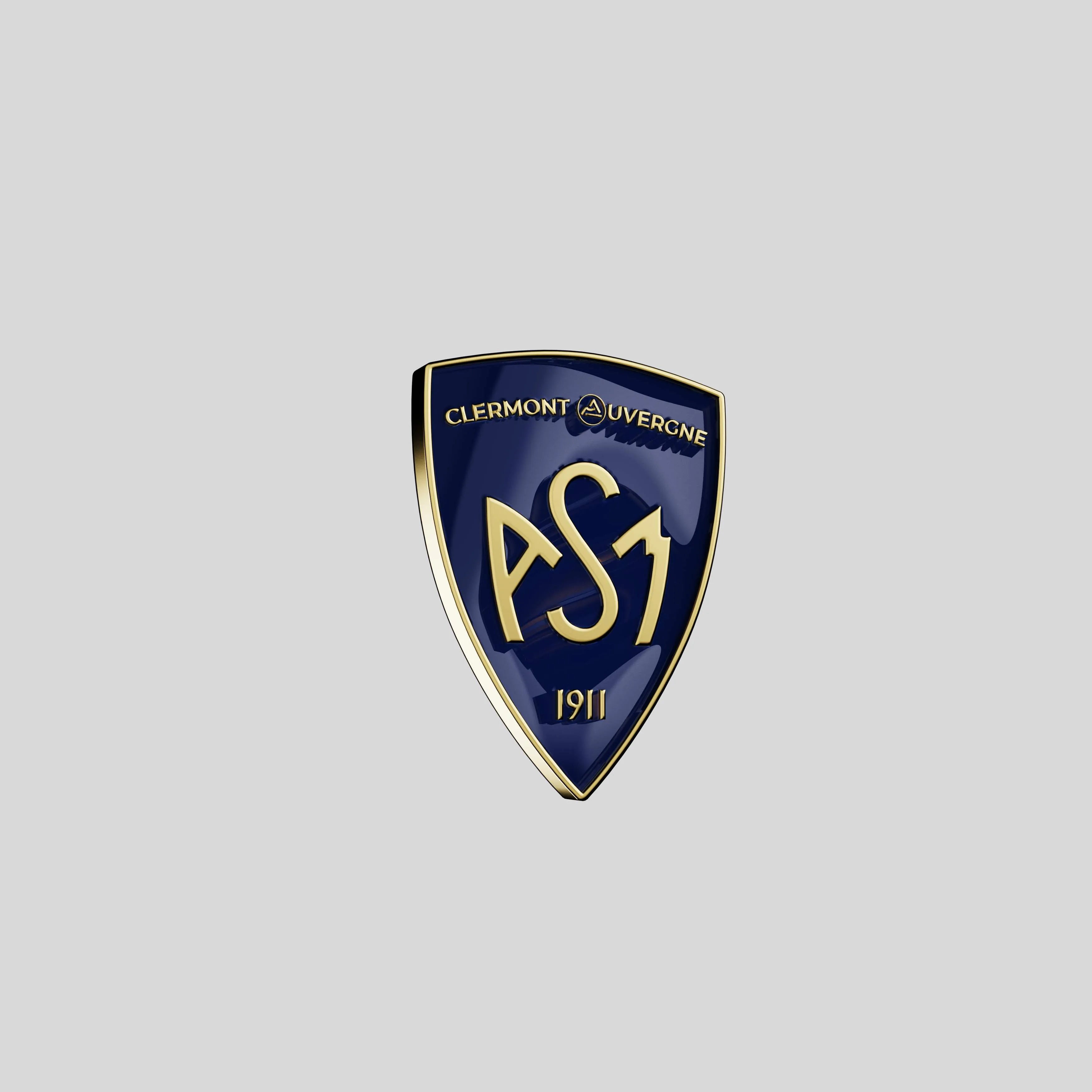 ASM Clermont Auvergne shield pin with navy enamel and gold metal outline, front view.