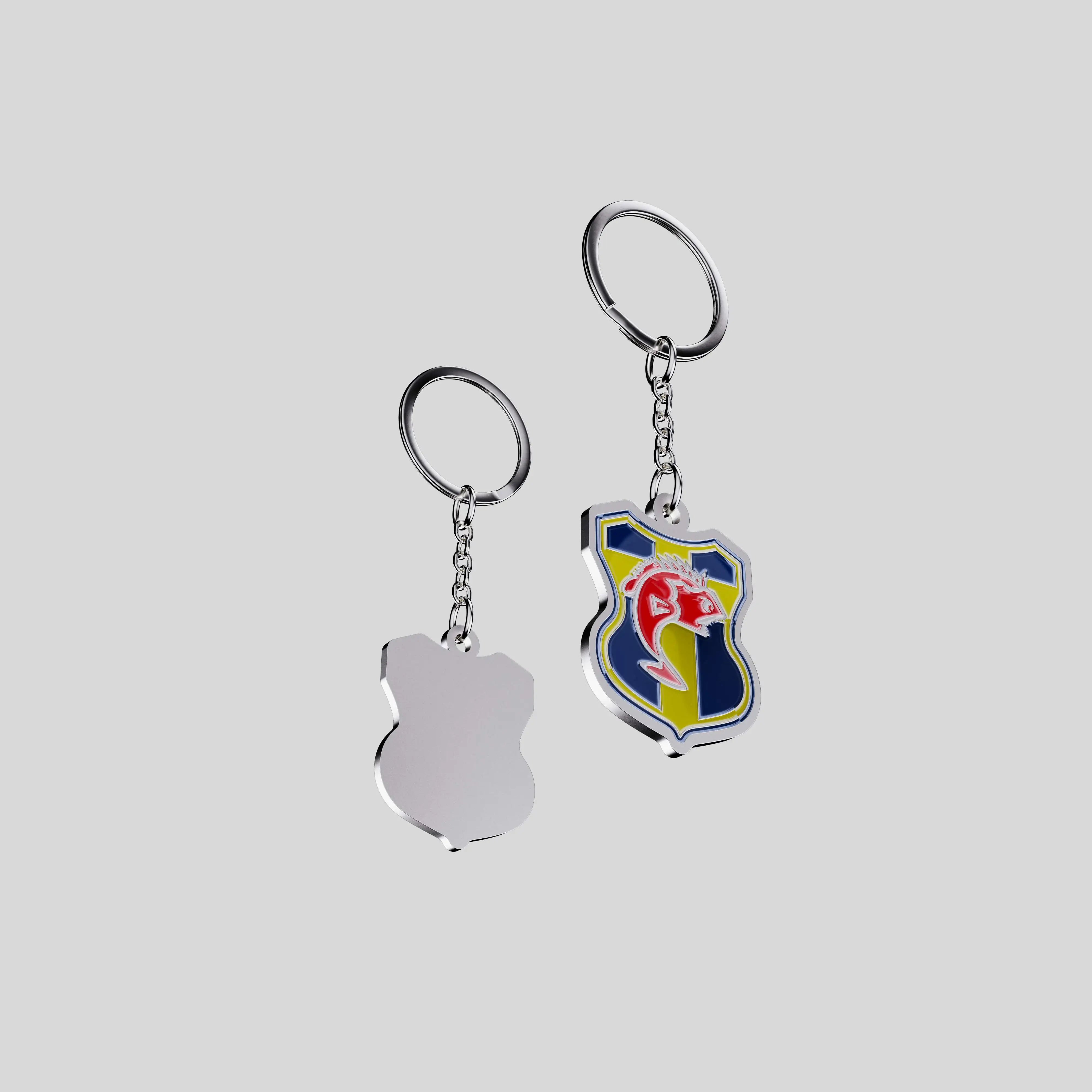Back view of the Sporting Club Toulon metal keychain showing polished metal finish and chain.