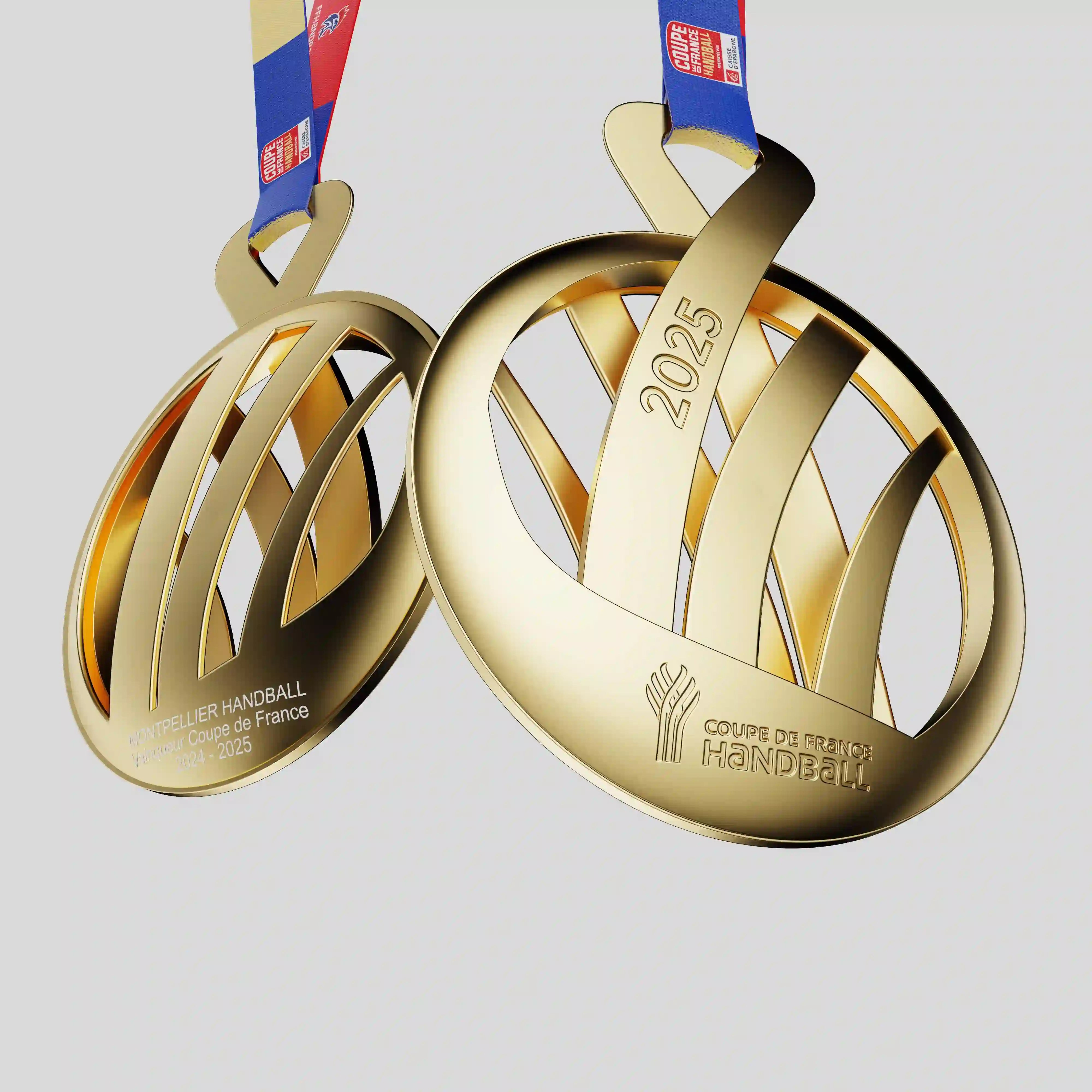 Gold medal for the Coupe de France Handball 2025 featuring intertwined shapes and engraved details