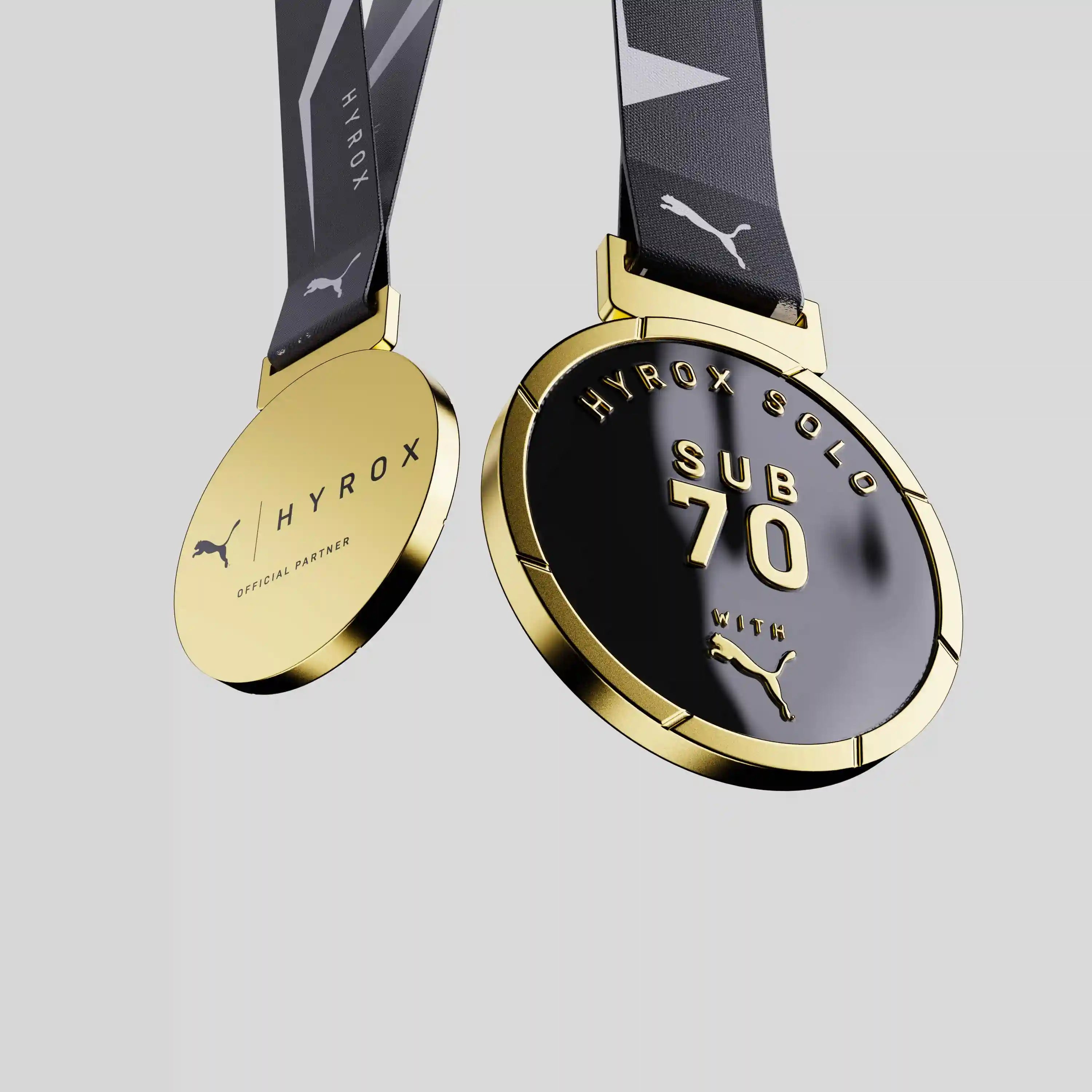 Official HYROX Puma finisher metal medal with black ribbon