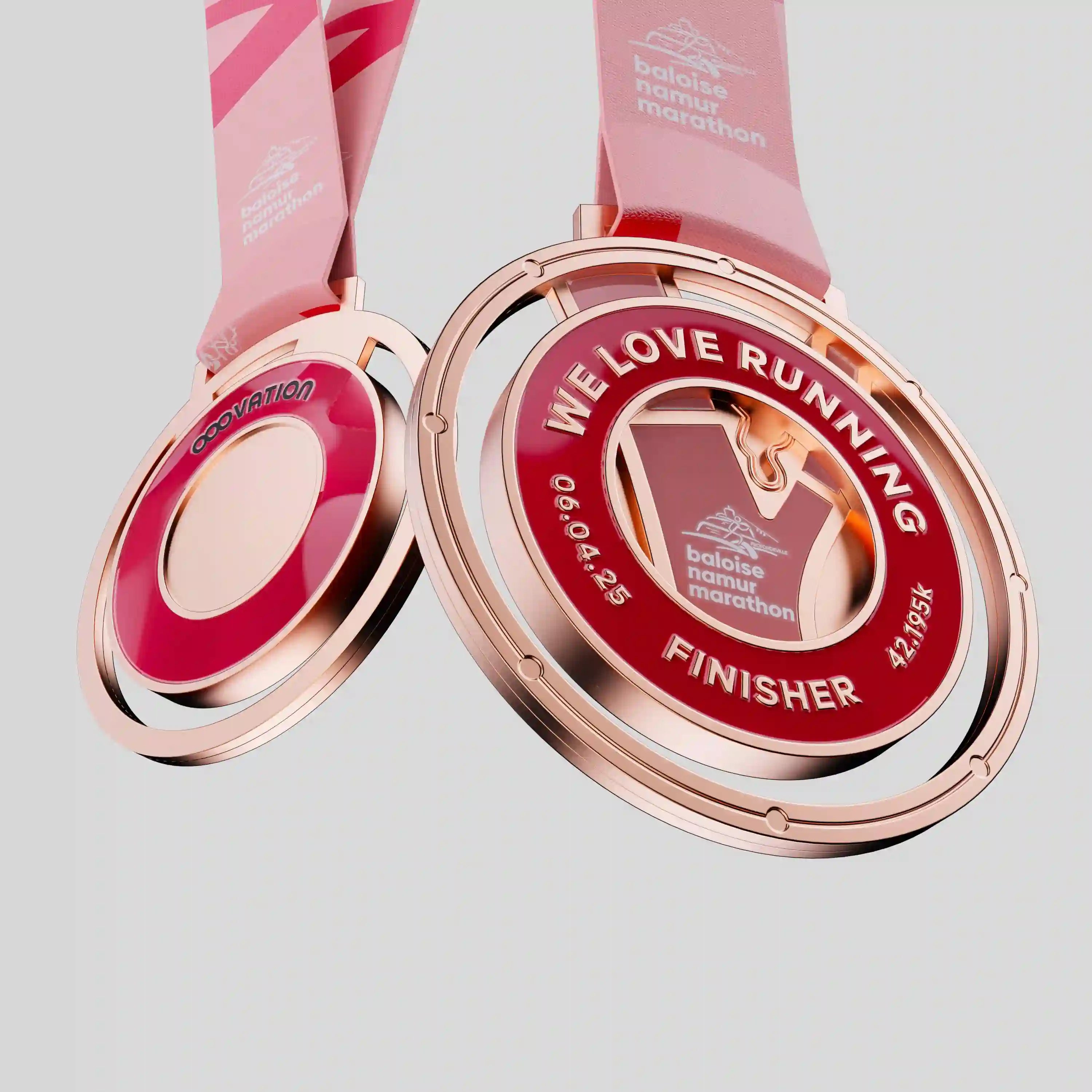 Official Namur Marathon finisher metal medal with pink ribbon