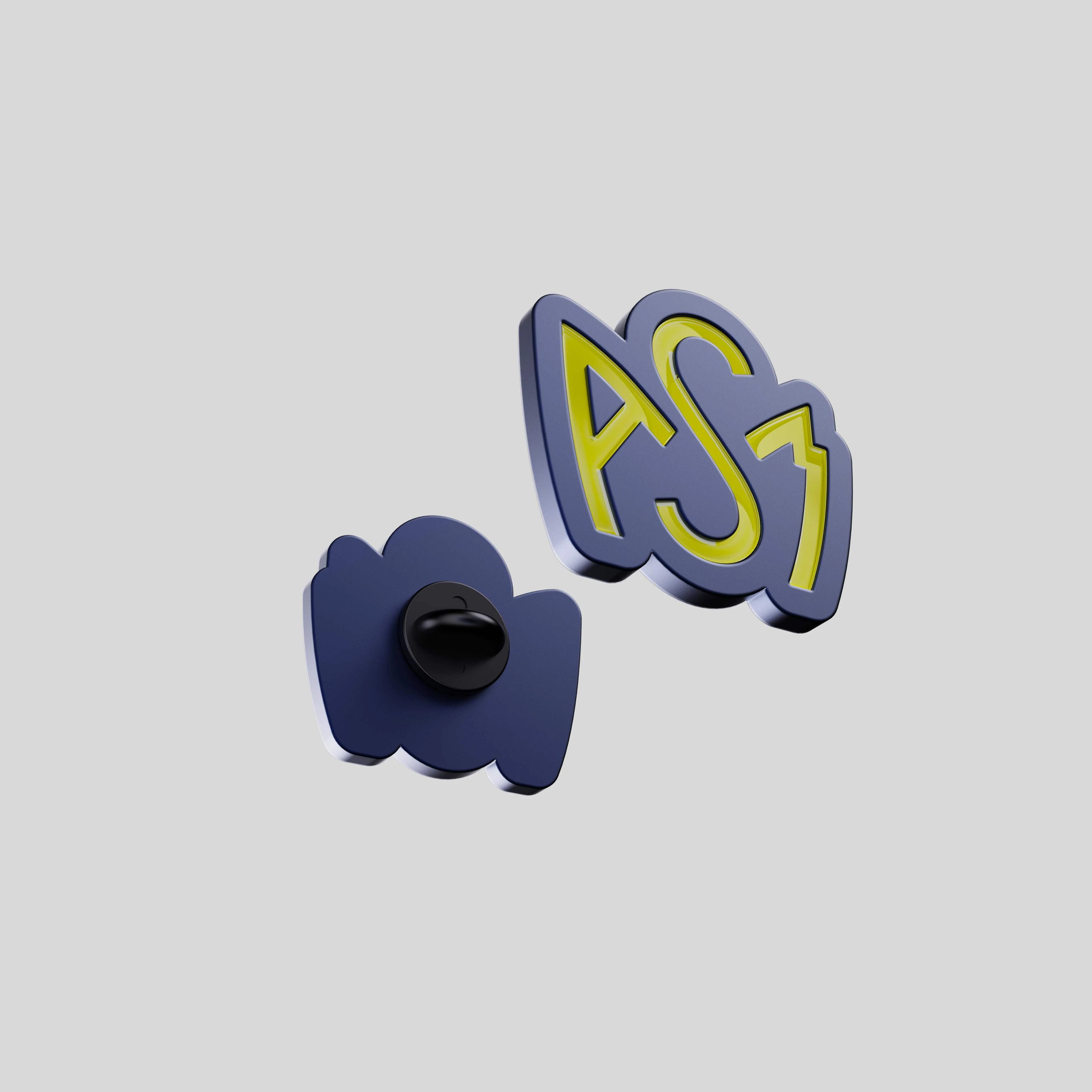 ASM enamel pin showing the back side with black rubber clutch attachment.