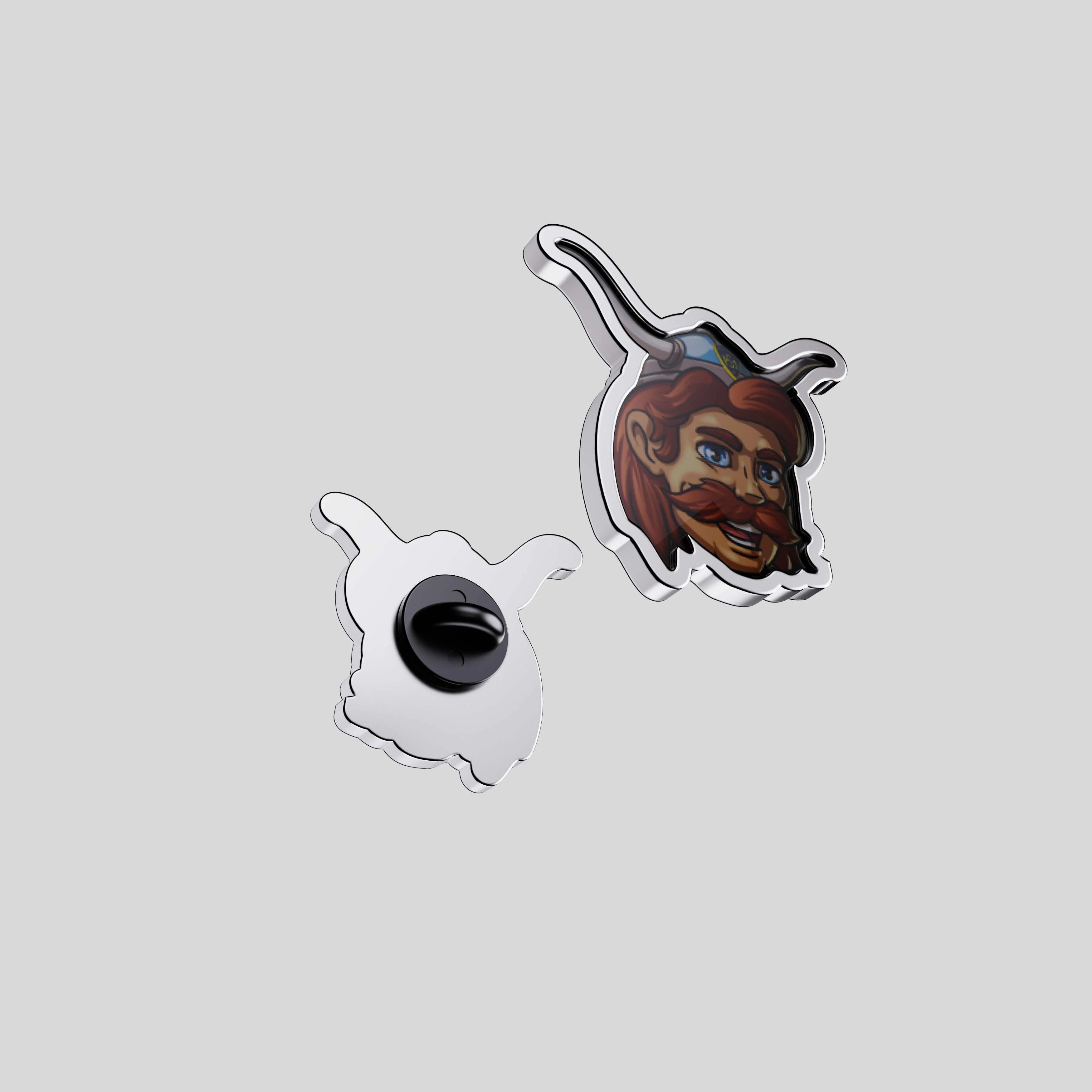 Back view of the ASM mascot pin showing metal base and black clutch attachment.