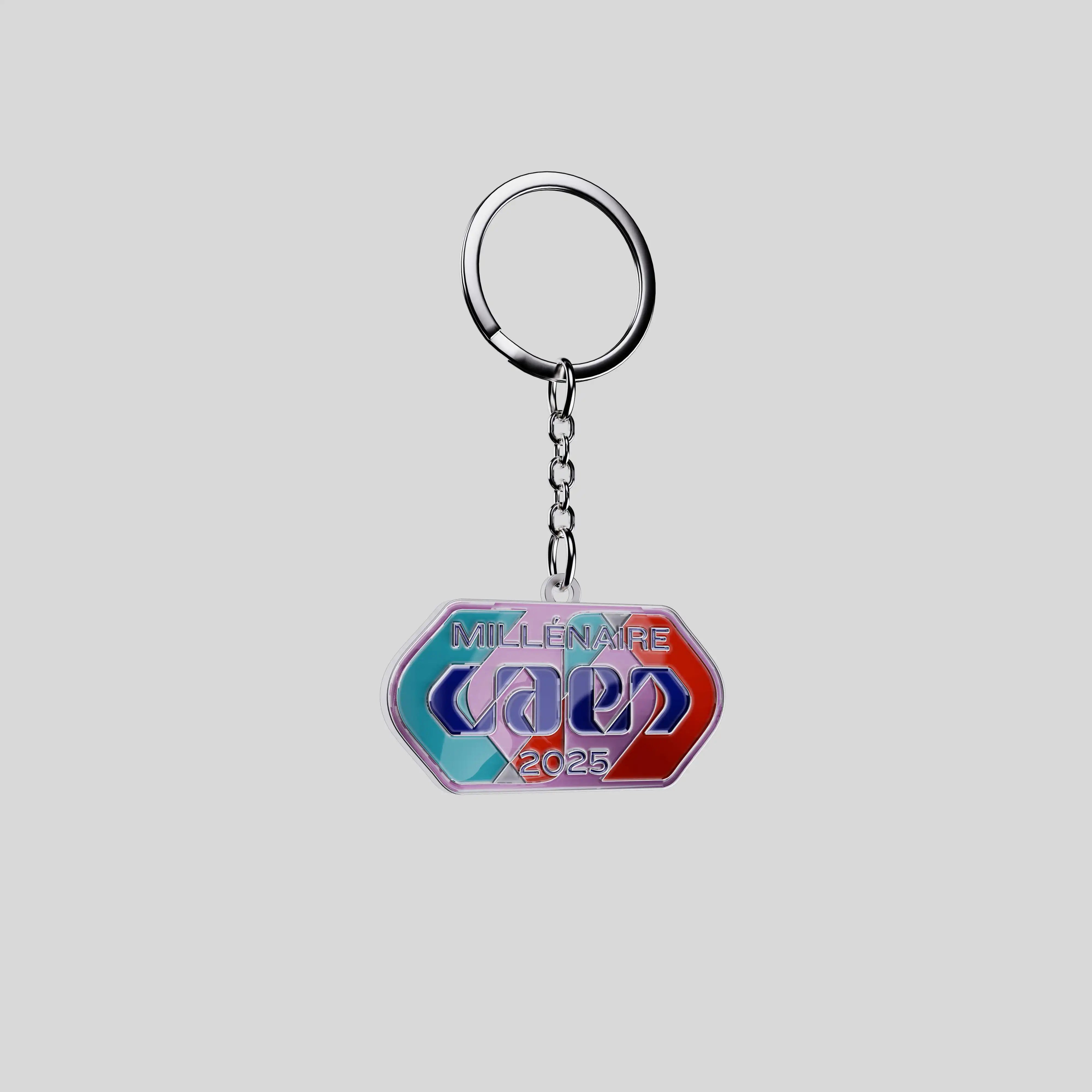City of Caen 2025 custom keychain with multicolour enamel and polished metal outline, front view.